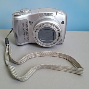 Canon PowerShot SX100 IS Digital Camera Silver Finish Original Box And +